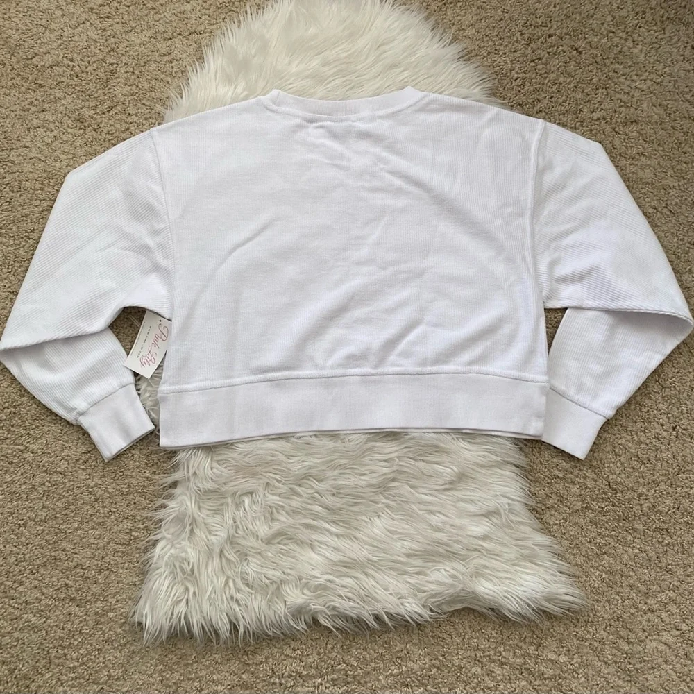 {Pink Lily} MERRY VARSITY WHITE CROPPED CORDED GRAPHIC SWEATSHIRT - Women’s - Picture 5 of 6